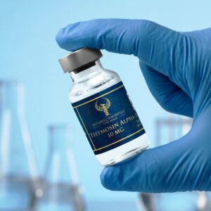 A close-up view focusing on a scientist's hand in a blue nitrile glove carefully holding a Resurrection Peptide Thymosin Alpha-1 10MG vial. Out-of-focus scientific glassware and erlenmeyer flasks are visible in the blue clinical background.